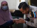Satlantas Polres Gresik Door to Door Salurkan Baksos