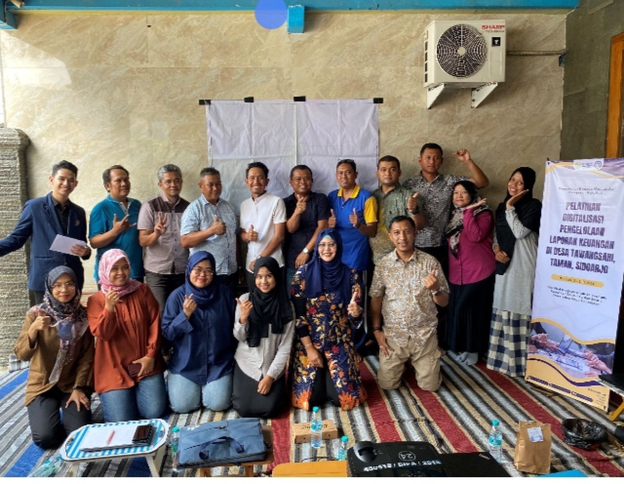 Pelatihan Digitalisasi Pengelolaan laporan keuangan di Desa Tawangsari