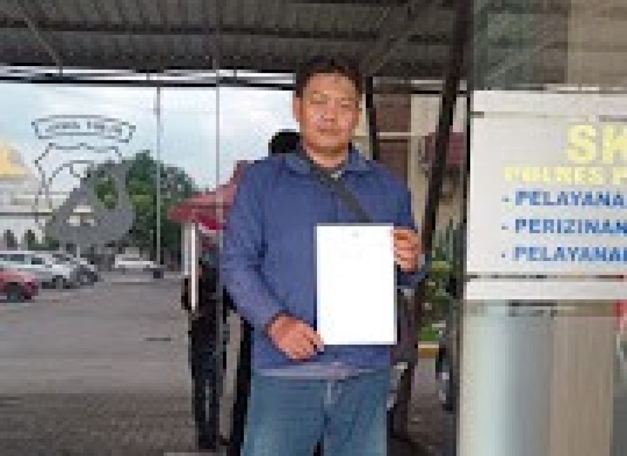 Mohammad Saihu Efendi saat laporan di Polres Pasuruan