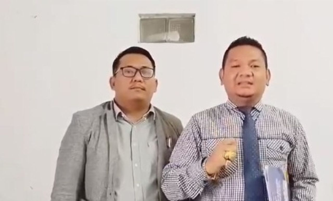 Olsen L. Tobing dan Boy Raja Marpaung