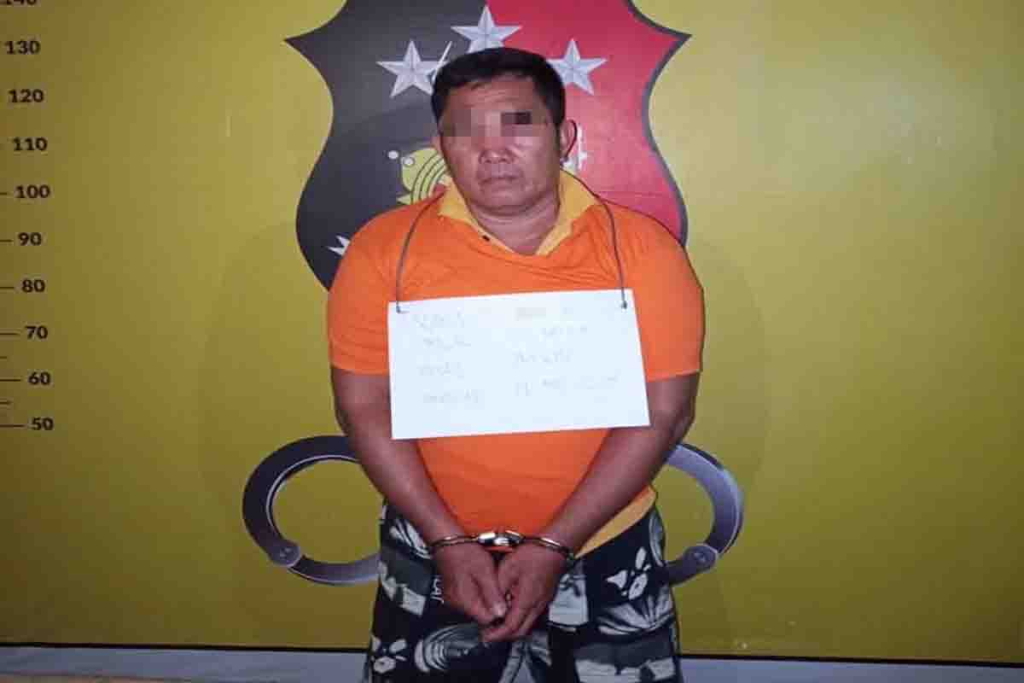 Tersangka inisial E