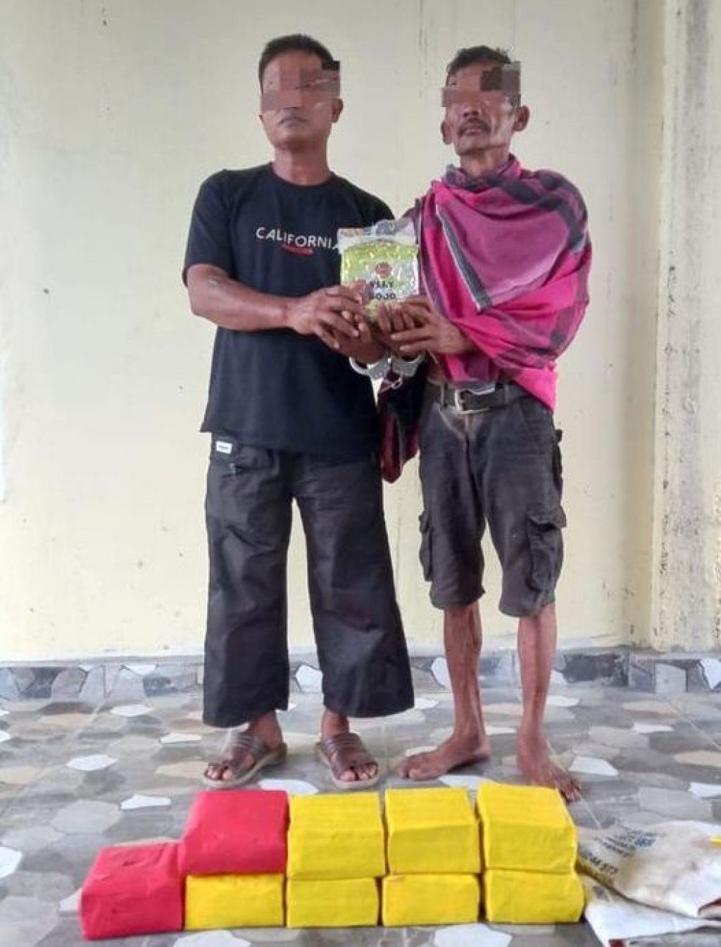 AS alias Aweng (47) dan SB (40 tahun)