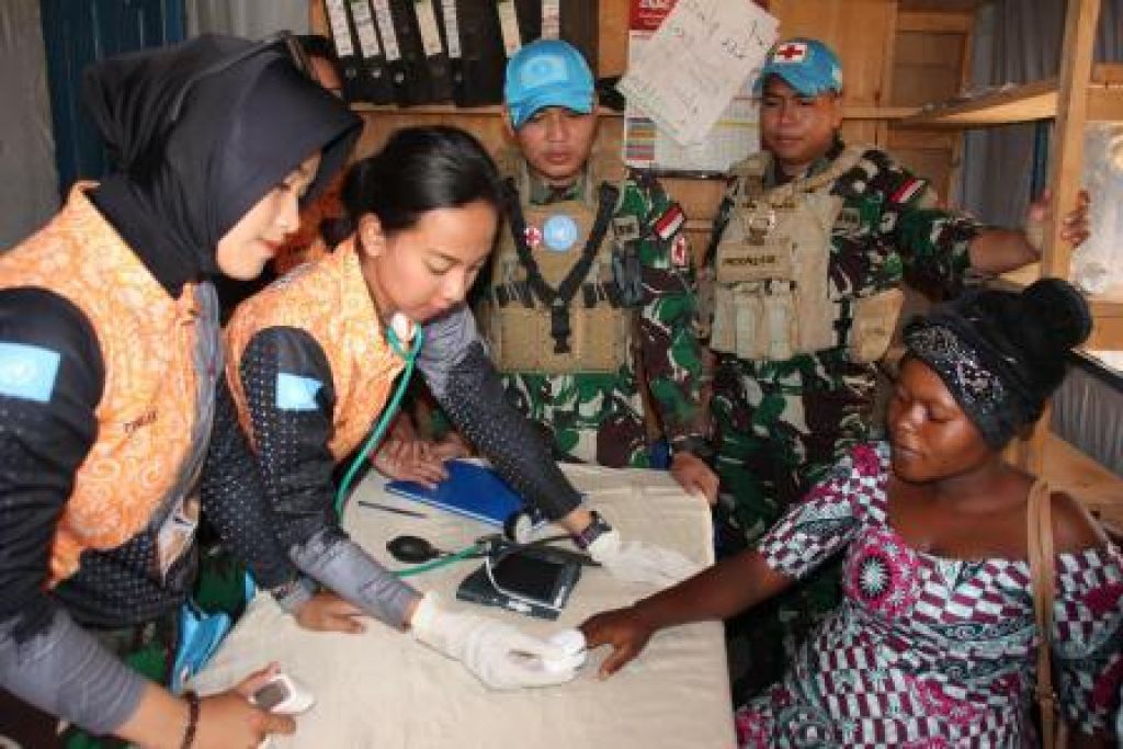 Kampanye kesehatan dan pawai bersama Asosiasi Wanita Irumu