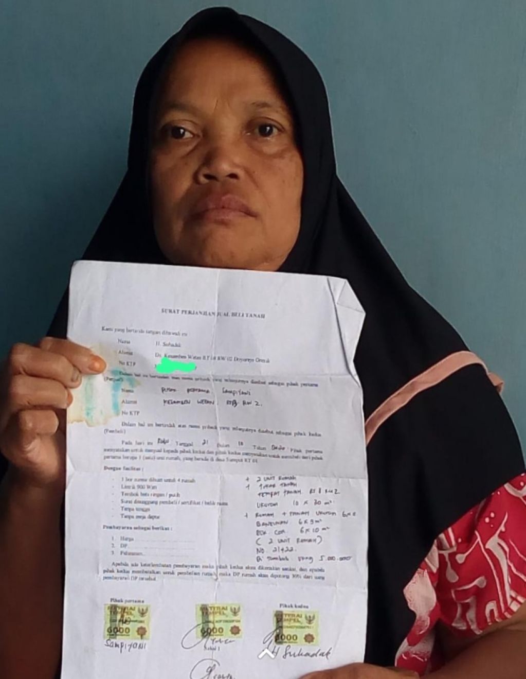Sampiyani menunjukkan surat kesepakatan