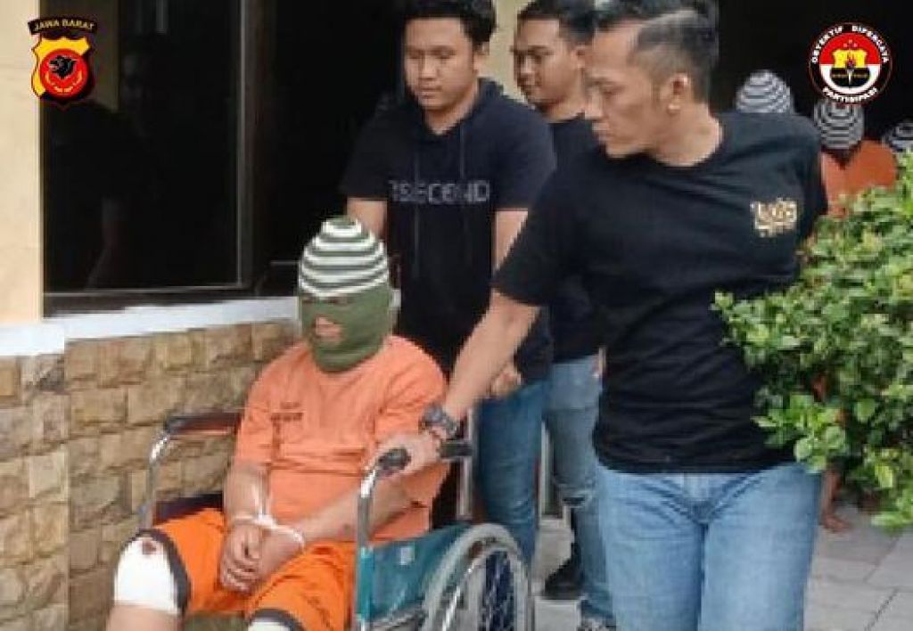 AS naik kursi roda